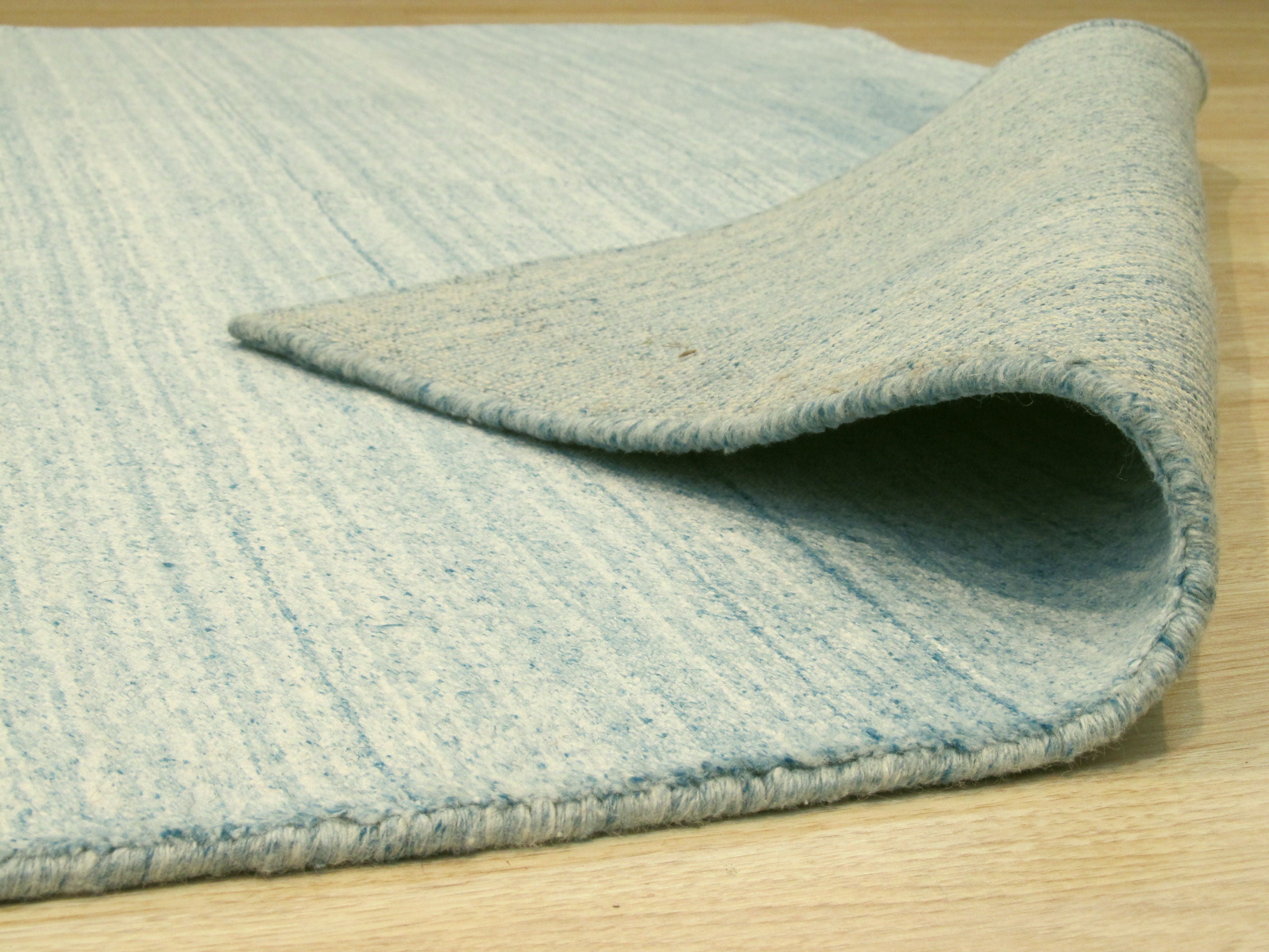 EORC Handmade Wool & Viscose Blue Contemporary Solid Urban Rug